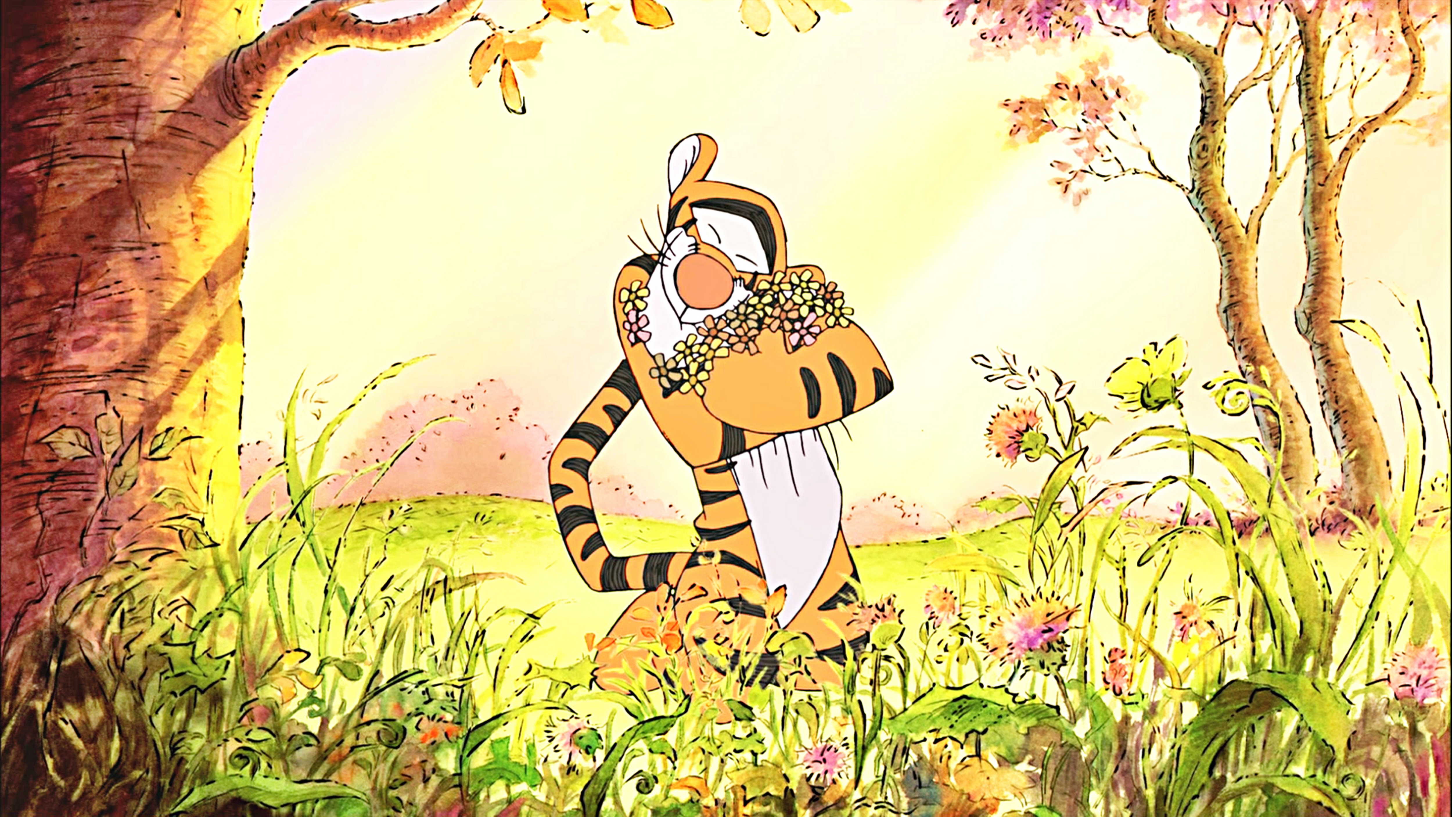 Tigger hugging flowers