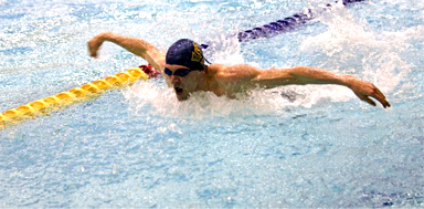 Jeff Milner swimming butterfly at the U of L