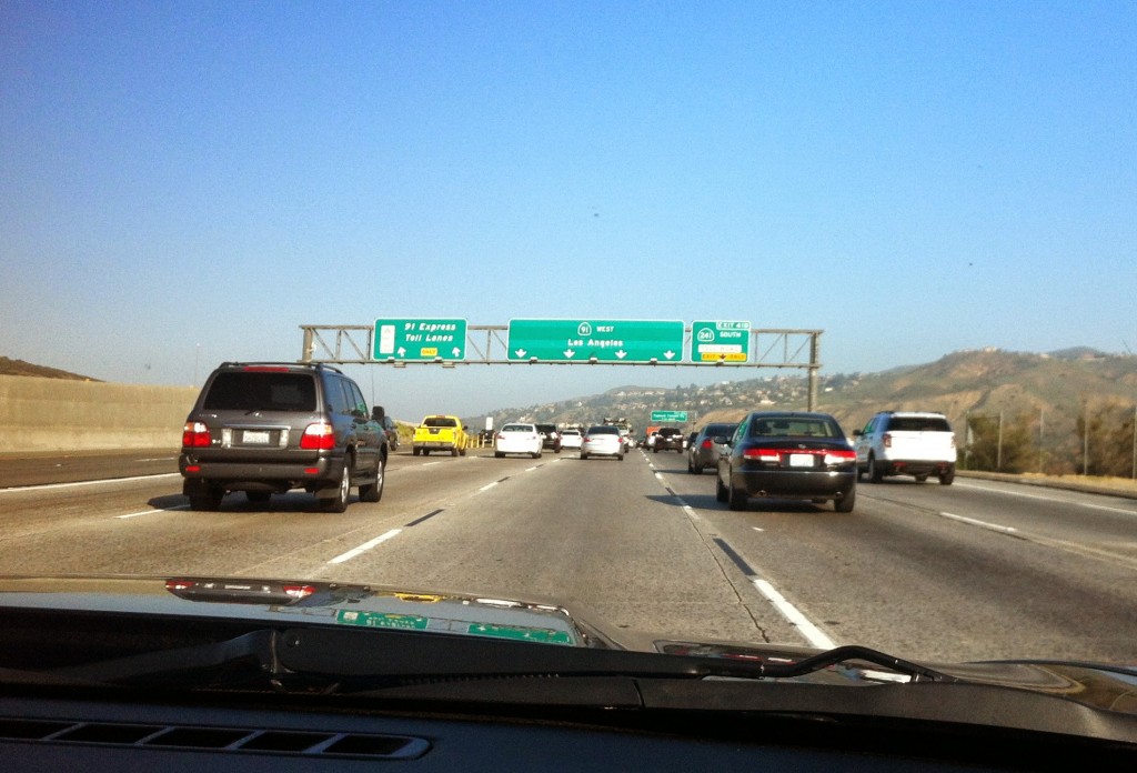 A sign shows the lanes that will take us to Los Angeles.