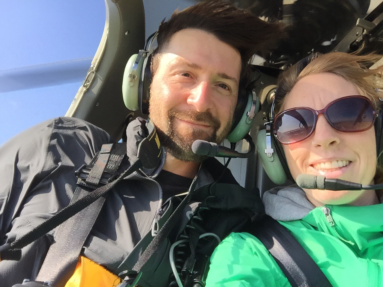 Jeff and Andrea inside an airborne helicopter